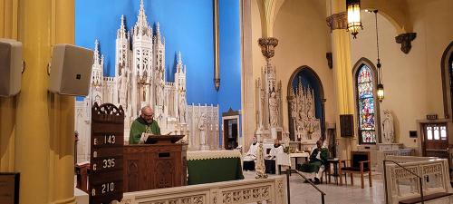 Fr Peter during mass